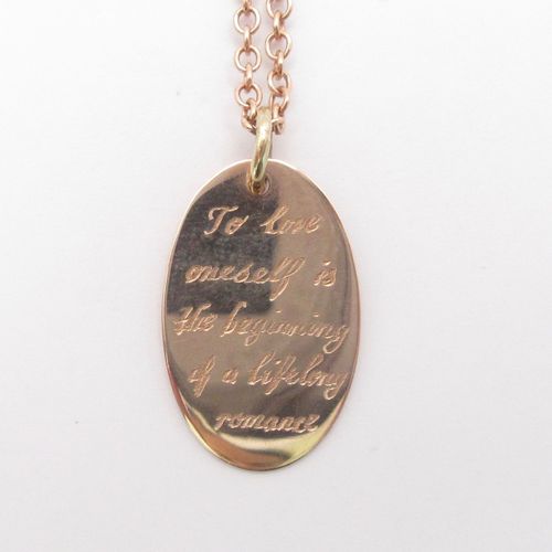 "To love oneself is the beginning of a lifelong romance" Engraved Disc Necklace