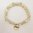 Antique Mother of Pearl Beaded Stretch Bracelet with Engraved Disc Charm