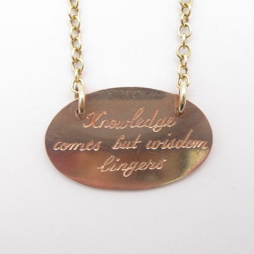 "Knowledge comes but wisdom lingers" Engraved Disc Necklace